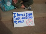 I have a sign. Please don't stomp my neck